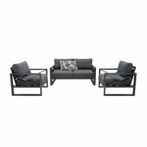 Aluminium outdoor furniture set from Linear Lounge collection, featuring a 4-seater lounge with charcoal frame and cushions, and a printed black and white cushion, perfect for outdoor lounging.