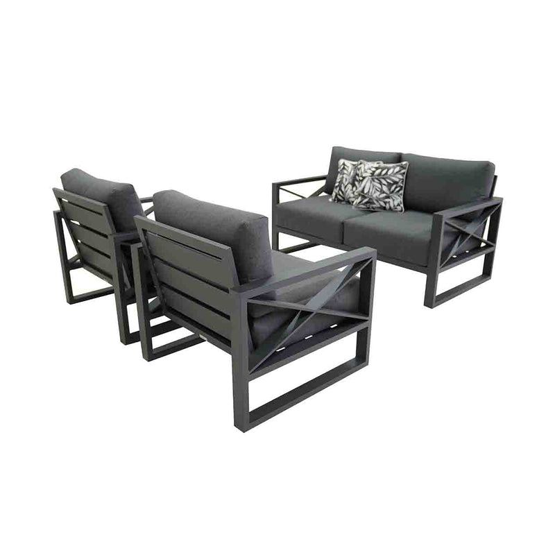 Aluminium outdoor furniture set from Linear Lounge collection, featuring a 4-seater lounge with charcoal frame and cushions, and a printed black and white cushion, perfect for outdoor lounging.